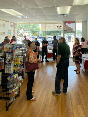 People talking to the staff at Funtastic Learning Toys Northwest Houston Store