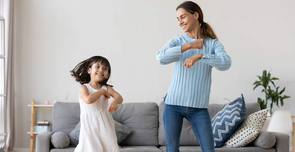 Mom and Daughter Dancing Together